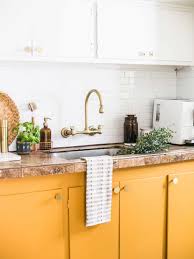 The blue walls in this kitchen stand out behind the white cabinetry. 750 Decorating Ideas Small Kitchens In 2021 Small Kitchen Kitchen Design Home Kitchens