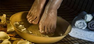 Image result for pictures of african feet soaked in herbs