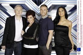 With simon cowell, demi lovato, l.a. X Factor Judges Seeking More Groups
