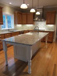 Or, it allows for counter space on one section and a cooktop on another. Pin By Katy Tremann On Kitchens Kitchen Island With Sink Kitchen Island Design Kitchen Island Decor