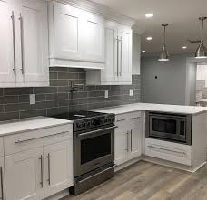 White kitchen cabinets with gray subway tile backsplash. White Kitchen Gray Subway Tile Whitekitchencabinetspulls Gray Kitchen Backsplash Dream Kitchen White Gray And White Kitchen