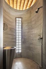 A mix of ann sacks surfaces, including a pebble wall covering, brings a warm feel to a guest bath of an aspen, colorado, home which was renovated by stonefox architects. Bvfxqt5oab8prm