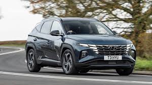 The climate controls are haptic instead of physical buttons; Hyundai Tucson 2021 Review Hybrid And Mhev Tested Car Magazine