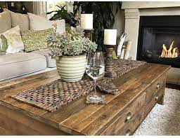 Functional and fashionable, a table runner may be placed directly on the surface of the table, or used atop a tablecloth for a layered look; Hip O Modern Living Rosewood Table Runner Decorating Coffee Tables Coffee Table Living Room Coffee Table