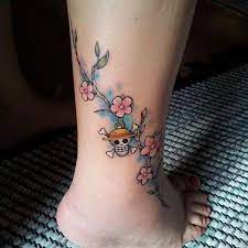 22 Subtle Anime Tattoos That Cleverly Reference Anime Series One Piece Tattoos Anime Tattoos Subtle Anime Tattoos