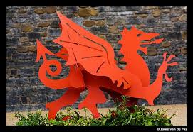 His red dragon symbol was attributed to welsh ancestors, and that dragon was recognized in 1801 as the official badge of wales. Welsh Dragon Welsh Dragon Wales Flag Dragon