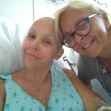 Prayers are being asked for Friar Megan Mills '98 who is valiantly battling  breast and liver cancer. Praying that Megan can get through this and be  able to enjoy her life with