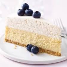 After Baking This Creamy Vanilla Cheesecake On A Vanilla Wafer Crust Gets A Sec