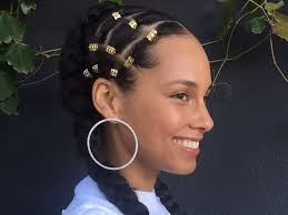 Fulani braids with massive ivory beads. 12 Gorgeous Braided Hairstyles With Beads From Instagram Allure