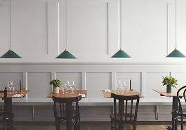 Currently Admiring The Interiors Of Fedtegreven Bistro Bodega Orchestrated By Emerging Copenhagen Design Star Bistro Interior White Wainscoting Cafe Interior