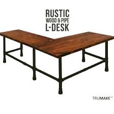 The industrial look is slowly popping up in furniture stores and all over the internet. L Shaped Desk Industrial Pipe Desk Style Rustic Wood And Etsy