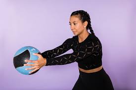 Yoga ball and aomen exercise. 23 Best Medicine Ball Exercises