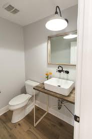 Rustic Industrial Powder Room With Reclaimed Metal And Wood Sink Base Farmhouse Bathroom Decor Chic Bathroom Decor Chic Bathrooms
