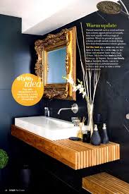 Black And Gold Bathroom Vanity The Art Of Living Mixing Black And Gold Make It Luxe Bathroom Vanity Designs Black Bathroom Mirrors Modern Bathroom Vanity