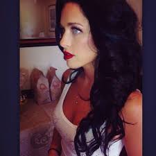 She has curly hair and hazel eyes. Pin On I Just Need To Start A Red Lip Board And Get It Over With