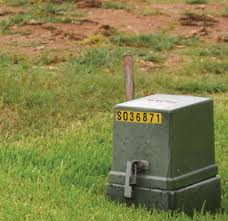 Round black pull box, 9 round, 10 deep, lid marked: Bluebonnet Electric Cooperative Bluebonnet Electric Newsroom