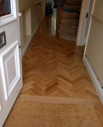 An Integrated Doormat Ensures That Grit And Dirt Isn T Brought Into The House We Used An Oak Boarder To Frame The Mat Flooring Wood Parquet Flooring