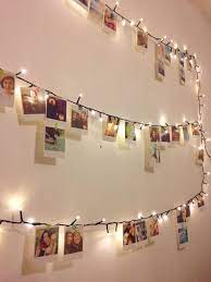 13 Ways To Use Fairy Lights And Make Your Bedroom Look Magical Fairy Lights On Wall Fairy Lights Bedroom Fairy Lights