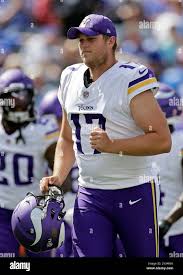 Minnesota Vikings punter Ryan Wright (17) runs off the field ...