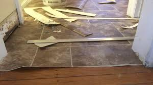 I have seen a sand entrained caulk that comes in several colours. How To Install Wood Floor Reducer Molding For Wood Floor Transitions Easiklip Floors