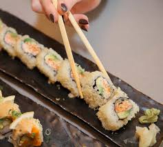 Take one slice and roll it into a long, thin rope; Tootsie Roll Nippon Sushi Bar Bloomfield Hills Mi
