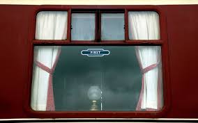 Passenger who stuffed £10 into a barrister's mouth after being asked to  stop pinching snacks from first class trolley found guilty of assault