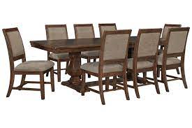 Windville Dining Table And 8 Chairs Ashley Furniture Homestore In 2021 Dining Table Black And White Dining Room Upholstered Side Chair