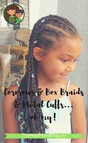 Teach your daughters to love their natural hair. Beautiful Protective Style Using Cornrows Box Braids And Metal Cuffs Great Option For Mixed K Mixed Kids Hairstyles Biracial Hair Care Mixed Girl Hairstyles