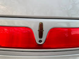 Image result for Light Prairie Tan 1998 Town Car