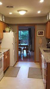 Oak Galley Kitchen Basic White Appliances Blanco Tulum Granite Gettysburg Grey Paint Working On New Floor And C Kitchen Style White Appliances Oak Cabinets