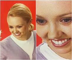 Meme of that white woman smiling but also looking in shock. The second image of her is a close up of the same face she makes.