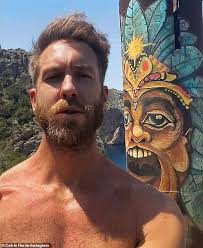 Shirtless Calvin Harris shows off his toned and tanned physique while  promoting his new album