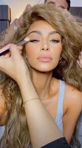 Kim Kardashian Debuts Blonde Hair Color, Kylie Jenner Calls It 'a Wig'