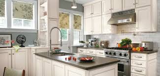There is a model(s) that clip(s) to the hinge if you have clip or clip top (name of their models) hinges. Aristokraft Cabinet Doors Cabinet