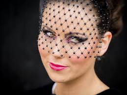 Wet day fashion: Monochrome dresses and rain ponchos