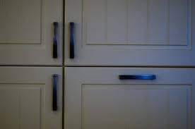 How To Paint Vinyl Kitchen Cabinets Hunker Repainting Kitchen Cabinets Cheap Kitchen Cabinets Painting Kitchen Cabinets