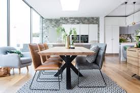 Two wire shelves on the table's base create the perfect space for decorative baskets, colorful dinnerware, and more. Finsbury Oak 240cm Hoxton Industrial Dining Table George Street Furnishers