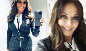 Did she show off her amazing legs, she also debuted a new choppier hair style. Carol Vorderman Sparks Frenzy In Skintight Leather Jumpsuit As She Unveils Transformation Celebrity News Showbiz Tv Express Co Uk