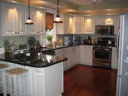 I love the look of white subway tile but will this . Medium Toned Kitchen Cabinets With Uba Tuba Our Kitchen Kitchen Designs Painting Kitchen Cabinets Painted Kitchen Cabinets Colors Trendy Kitchen Backsplash