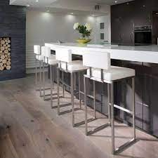In the middle of the island, their lies a pond with lily pads and a wooden bridge going across it. 12 Nice Ideas For Your Modern Kitchen Design Modern Kitchen Bar White Kitchen Bar Stools Modern Bar Stools Kitchen