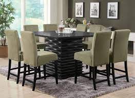 It is easier to get off a stool than a lower chair, and if you have back or leg problems the table has got a solid construction and a black color. Stanton Collection Stanton Contemporary Black Counter Height Table 102068 Tables Unique Home Furniture