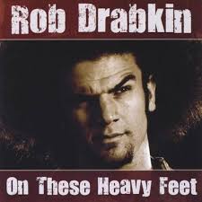 Amazon.com: On These Heavy Feet: תקליטורים ותקליטים