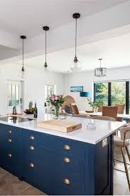 With over 20 years of investing experience, and more than 70 completed. Read All About This Bespoke Kitchen In Herne Bay With A Blue Kitchen Island Brass Cup Pull Handles In 2020 Blue Kitchen Island Blue Kitchens Kitchen