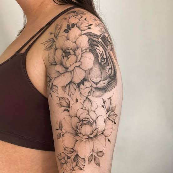 Stunning Tiger and Floral Half Sleeve: A Bold Statement for Women