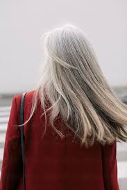 The luscious curls are great options for the parties and dates. Back View Of Mature Woman With Grey Long Hair In The City By Bonninstudio Grey Mature