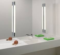 Create a feature of mirrors and wall art with this stylish bathroom wall light. Aurora Galeria Kinkiety Do OÄº Wietlenie Lustra Äº Azienkowego Äº Azienkowe Inspira Bathroom Mirror Lights Bathroom Led Light Fixtures Bathroom Lighting