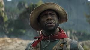 The popular fantasy adventure franchise began with the 1995 film starring the late robin williams as a man who is unwittingly brought back from being trapped inside a supernatural board game since he was a boy. Red Bandana Headband Worn By Kevin Hart In Jumanji The Next Level Spotern