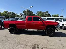 Image result for Medium Red 2000 Dodge