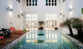 New Majestic Hotel A Revamped Historic Hotel On A Chinatown Street In Singapore Once Notorious For H Luxury Hotel Design Hotel Interior Design Majestic Hotel