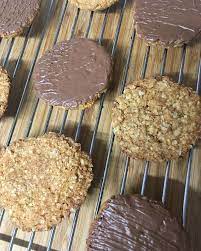 After A Long Week What Better Way To Unwind Than With These Home Baked Oatmeal Biscuits Brushed With Chocolate Perfect Oatmeal Biscuits Baked Oatmeal Baking